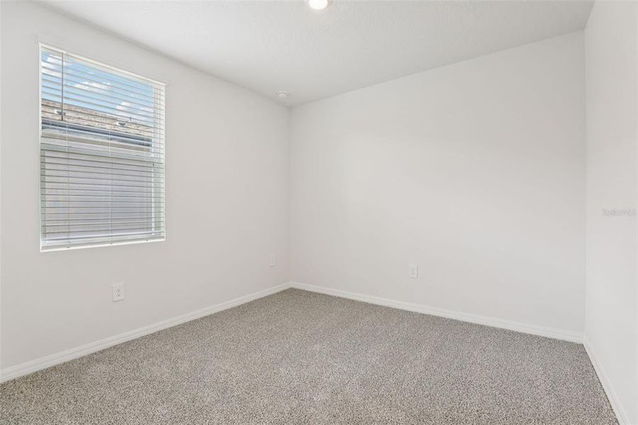 Spacious, unfurnished interior of a new home in Lawson Dunes - Signature Series, Haines City (Image 27).