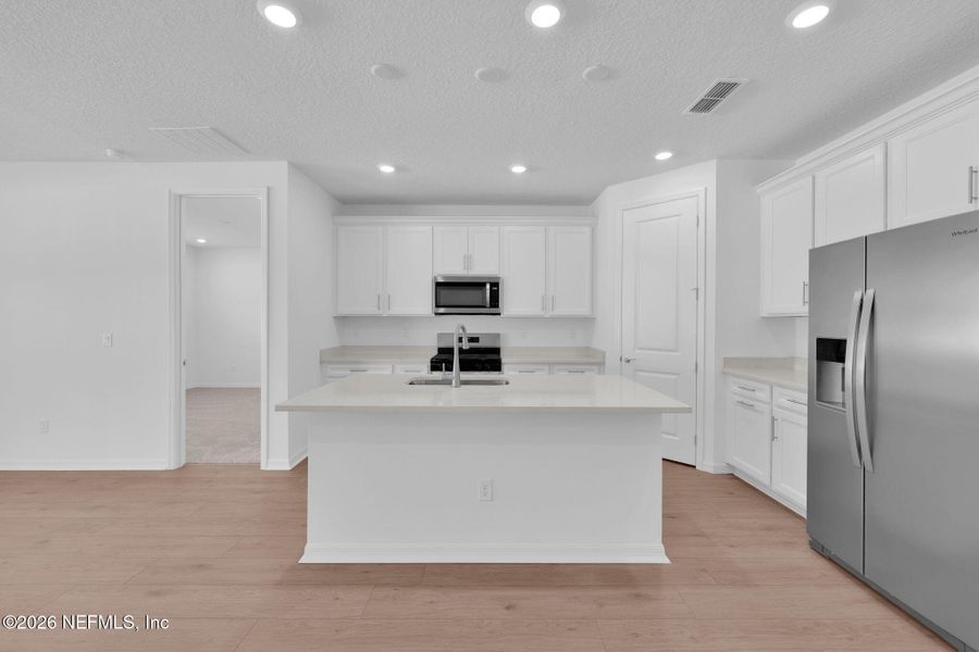 Furnished interior view inside a new home in Double Branch, Middleburg (Image 5).