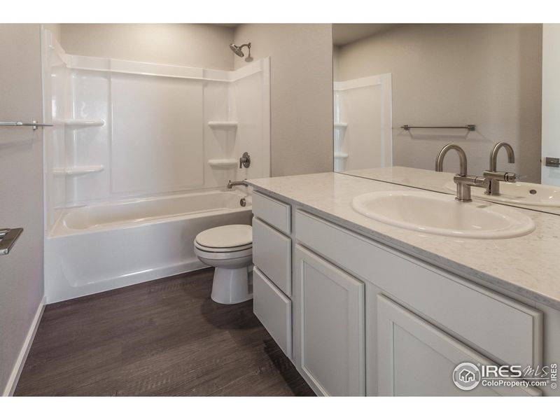 Furnished interior view inside a new home in Trailside Alley Load - Single Family Homes, Timnath (Image 8).