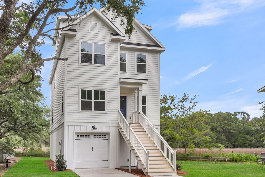Front exterior of a new home in , Charleston, SC, highlighting curb appeal (Image 25).