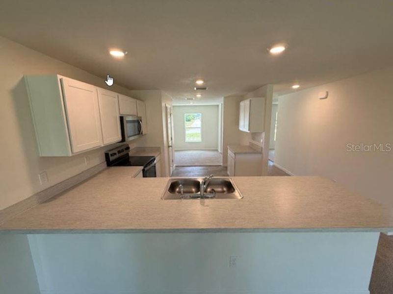 Furnished interior view inside a new home in Palm Coast: Value Collection, Palm Coast (Image 6).