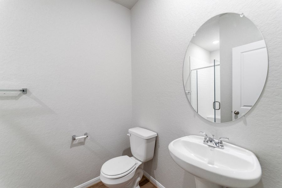 Furnished interior view inside a new home in Hennersby Hollow, San Antonio (Image 11).