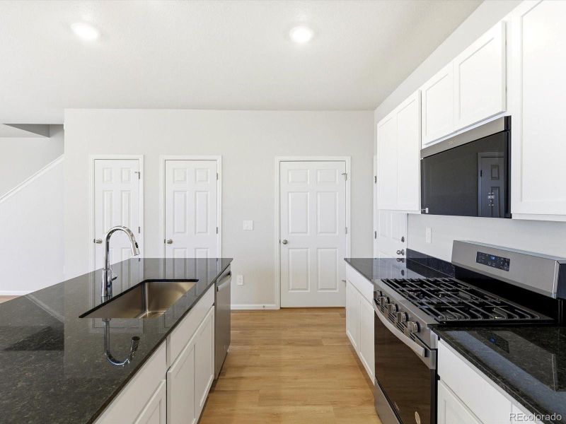 Furnished interior view inside a new home in , Aurora (Image 9).