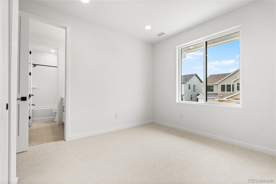 Spacious, unfurnished interior of a new home in Stargaze at Solstice, Littleton (Image 40).