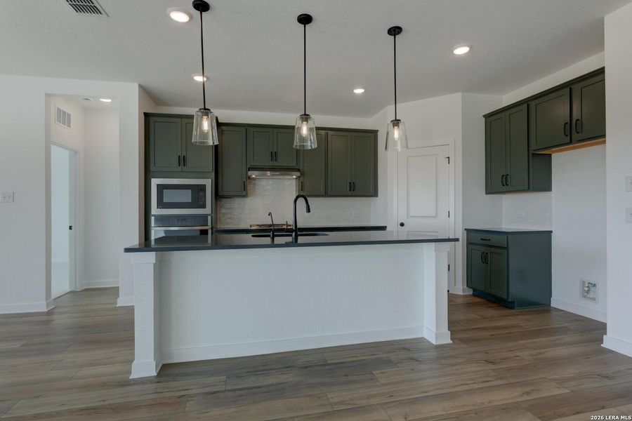 Furnished interior view inside a new home in Nopal Valley, San Antonio (Image 7).