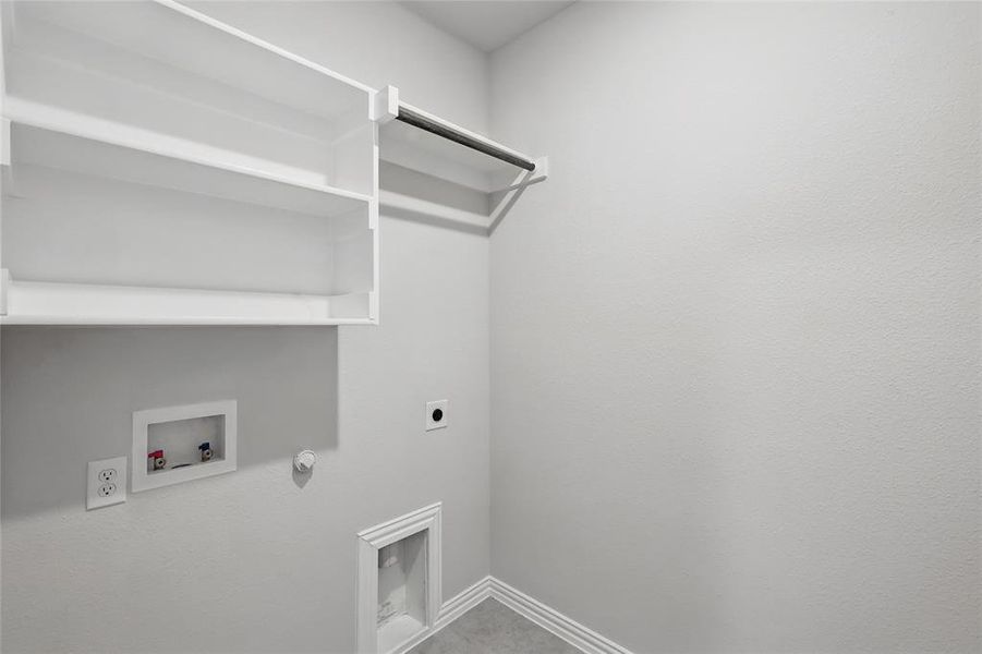 Laundry room with hookup for a gas dryer, hookup for a washing machine, and hookup for an electric dryer