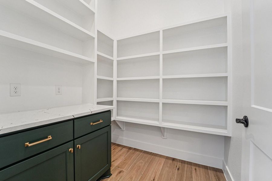 Furnished interior view inside a new home in Evergreen, Conroe (Image 19).