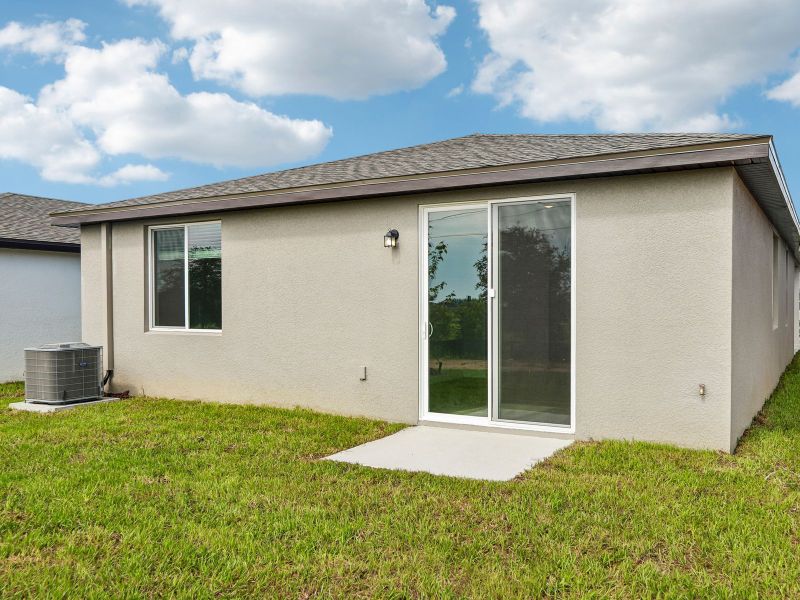 Exterior details and patio area of a home in Benton Hills - Premier Series, Brooksville (Image 3).