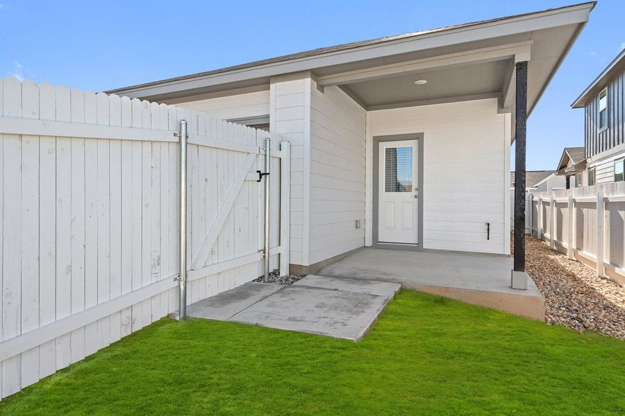 Exterior details and patio area of a home in Porter Country, Kyle (Image 7).