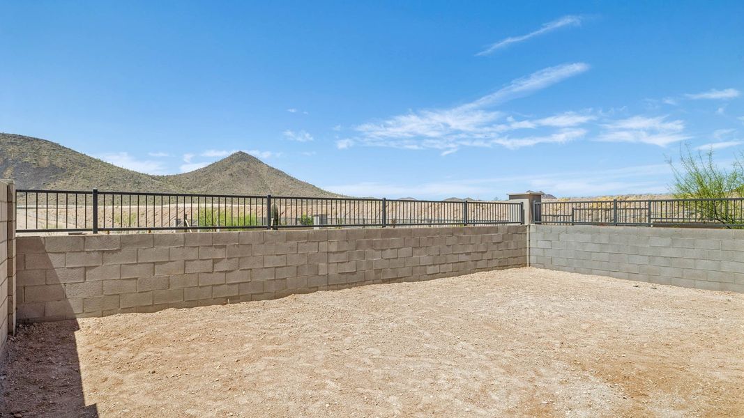 Exterior details and patio area of a home in The Buttes at Mystic, Peoria (Image 23). Exterior details and patio area of a home in The Buttes at Mystic, Peoria (Image 23).
