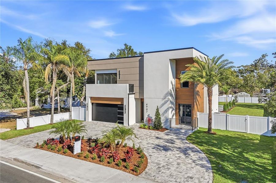 Front exterior of a new home in , Tampa, FL, highlighting curb appeal (Image 27).