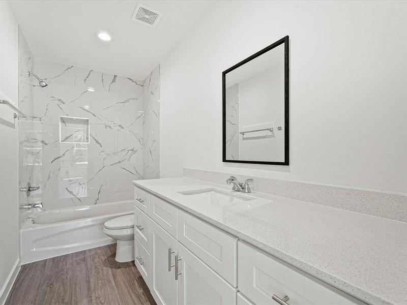 Get ready in style with the spacious bathroom counters, offering plenty of room for your personal care products.