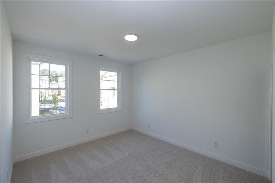 Spacious, unfurnished interior of a new home in Waterhaven, Cumming (Image 18).