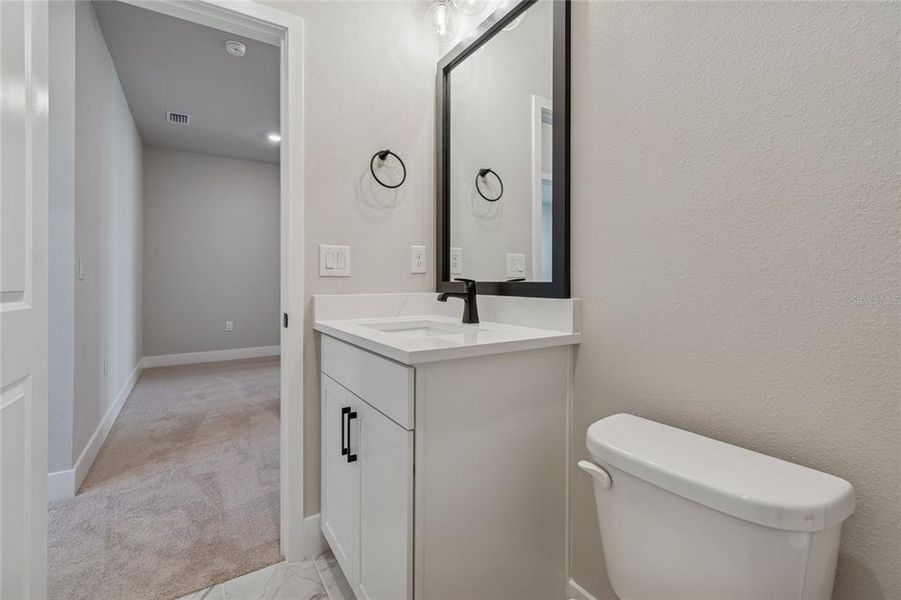 Furnished interior view inside a new home in Emerald Landing at Waterside at Lakewood Ranch – Towns, Sarasota (Image 17).