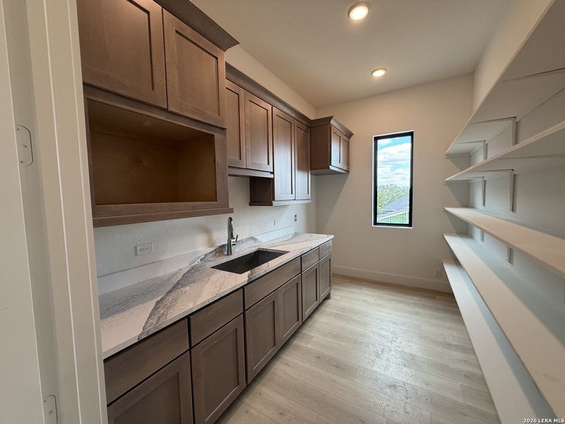Furnished interior view inside a new home in Caliza Reserve, Boerne (Image 11).