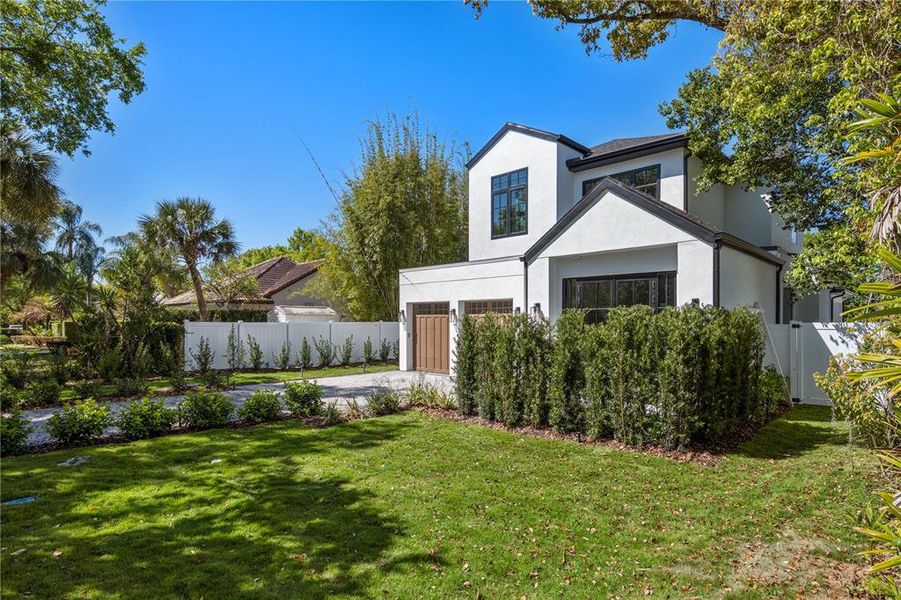 Front exterior of a new home in , Winter Park, FL, highlighting curb appeal (Image 26).