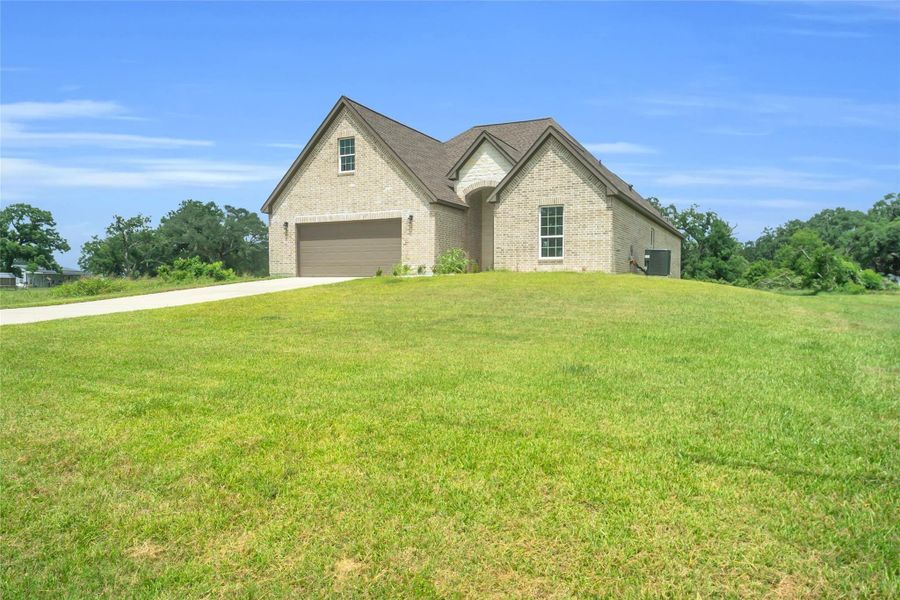 Front exterior of a new home in , Angleton, TX, highlighting curb appeal (Image 2). Front exterior of a new home in , Angleton, TX, highlighting curb appeal (Image 2).