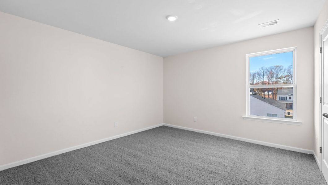 Representative unfurnished interior of a home built from the Biltmore by D.R. Horton in Hunters Ridge, Woodruff (Image 26).