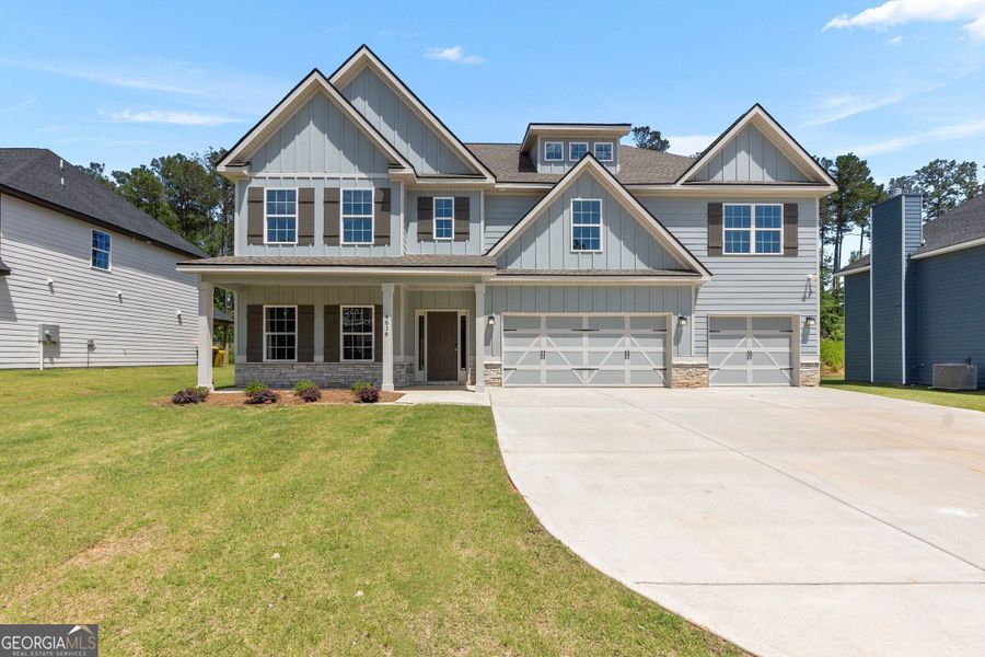 Front exterior of a new home in Juliette Crossing, Forsyth, GA, highlighting curb appeal (Image 26).