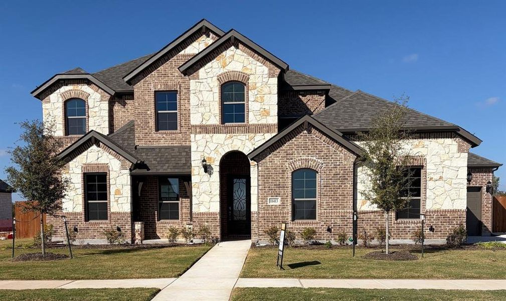 Front exterior of a new home in Callan Village, Lorena, TX, highlighting curb appeal (Image 1). Front exterior of a new home in Callan Village, Lorena, TX, highlighting curb appeal (Image 1).