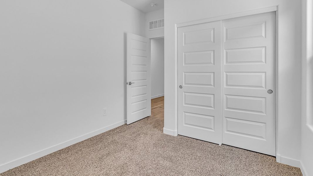 Spacious, unfurnished interior of a new home in The Oasis at Rocking K, Vail (Image 34).