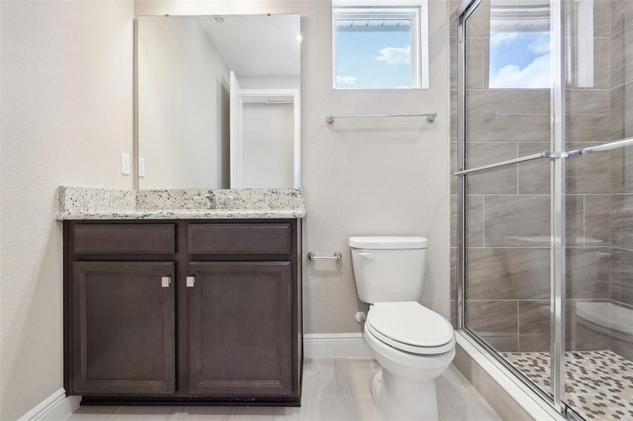Furnished interior view inside a new home in Laureate Park, Orlando (Image 17).