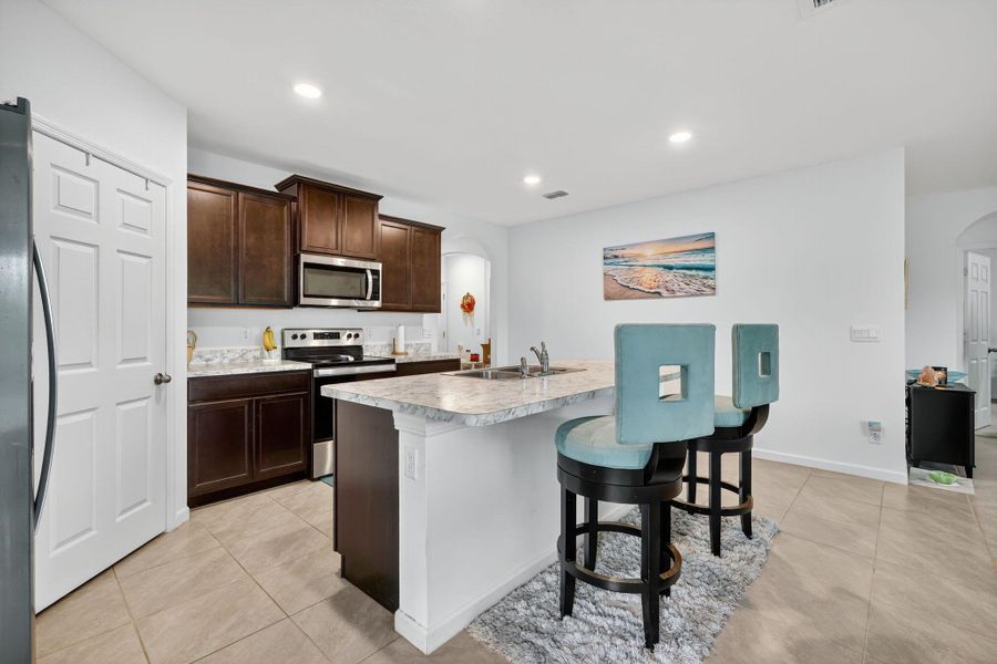 Furnished interior view inside a new home in , Port St. Lucie (Image 6).