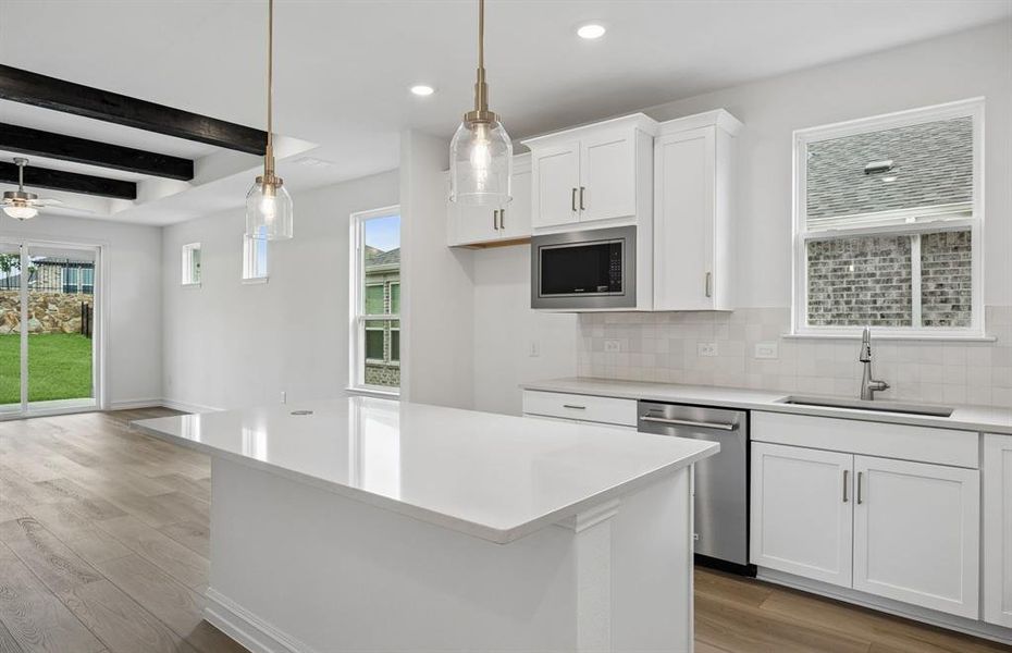 Kitchen with eat in bartop island