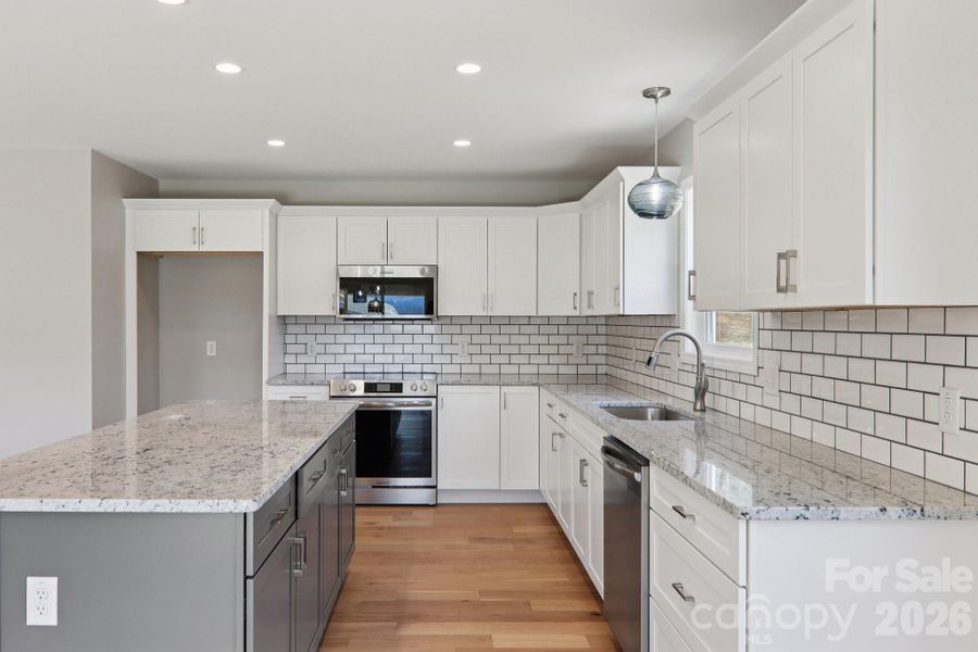 Furnished interior view inside a new home in , Candler (Image 5). Furnished interior view inside a new home in , Candler (Image 5).