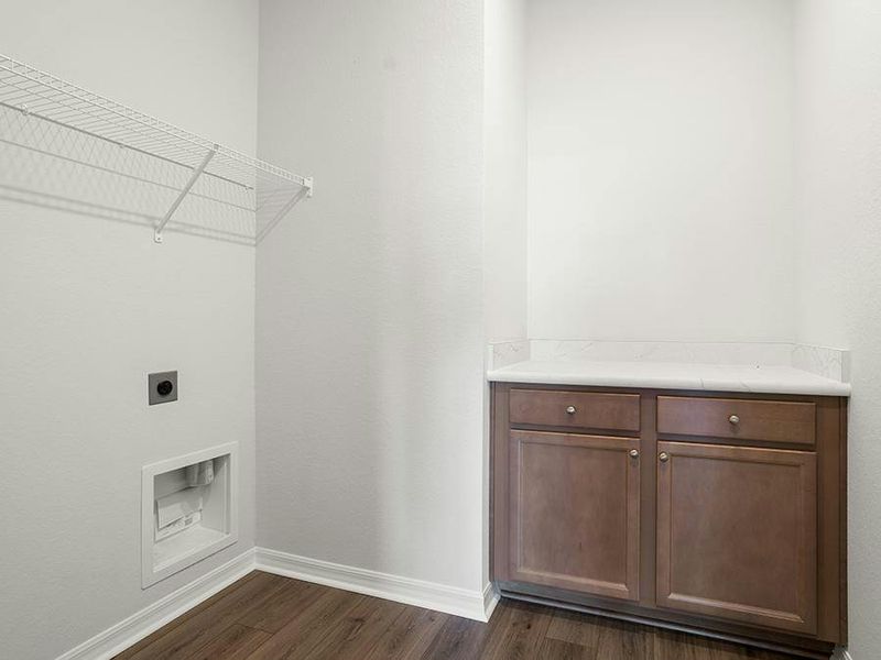 You will appreciate the convenience of a dedicated laundry room - Everly by Highland Homes