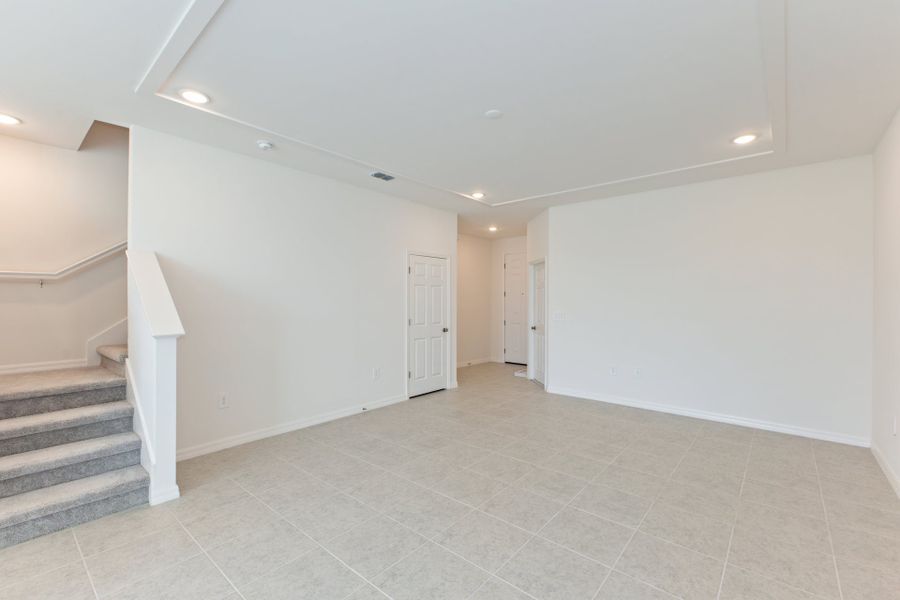 Representative unfurnished interior of a home built from the Carter by Park Square Residential in Townwalk at Babcock Ranch, Punta Gorda (Image 7).