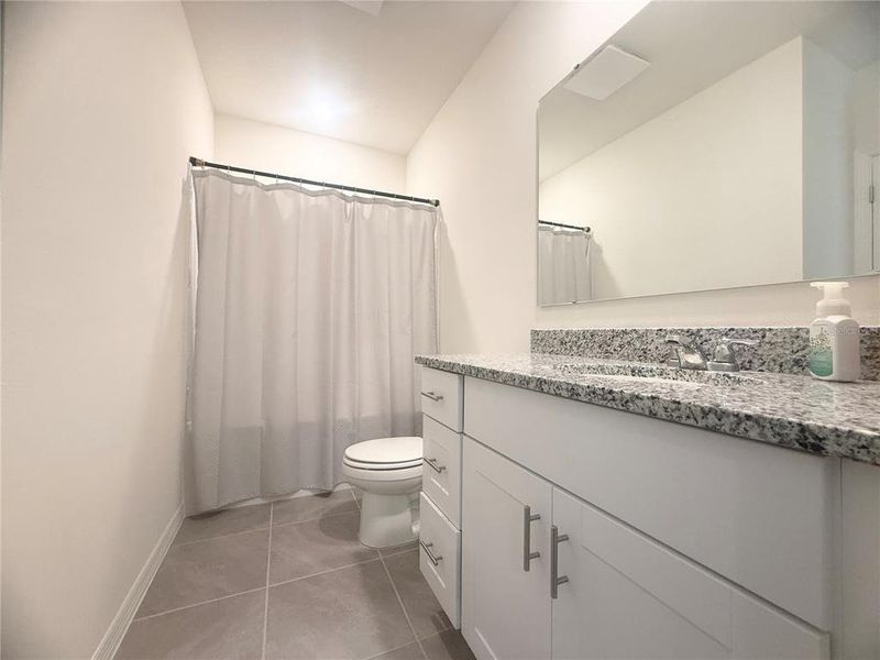 Furnished interior view inside a new home in , Kissimmee (Image 26).