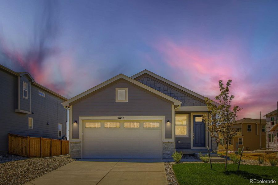 Front exterior of a new home in Buffalo Highlands – Commerce City, Commerce City, CO, highlighting curb appeal (Image 18).