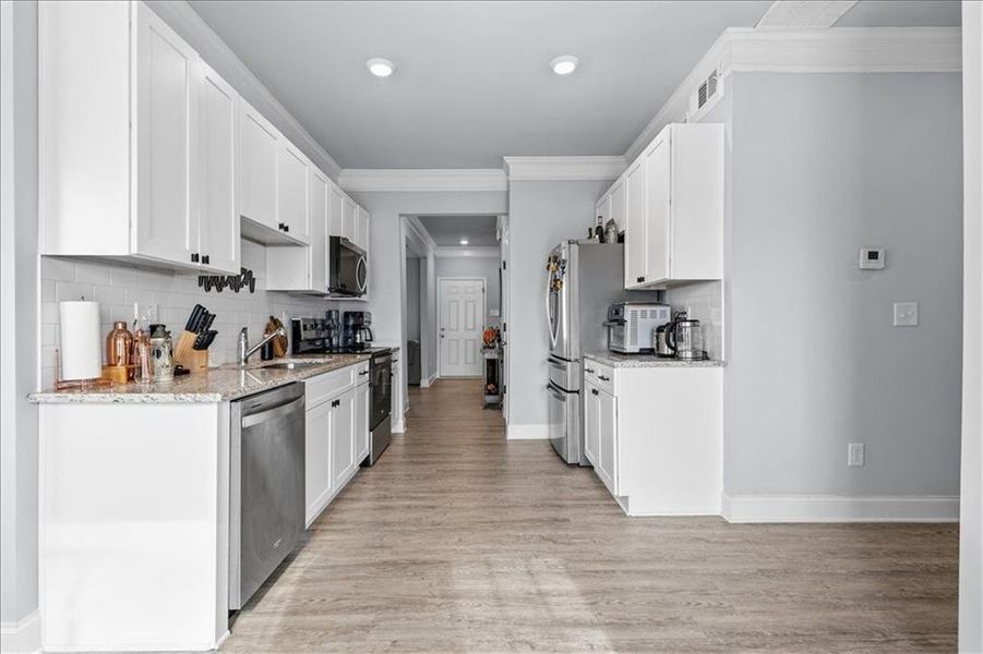 Furnished interior view inside a new home in , Atlanta (Image 7).