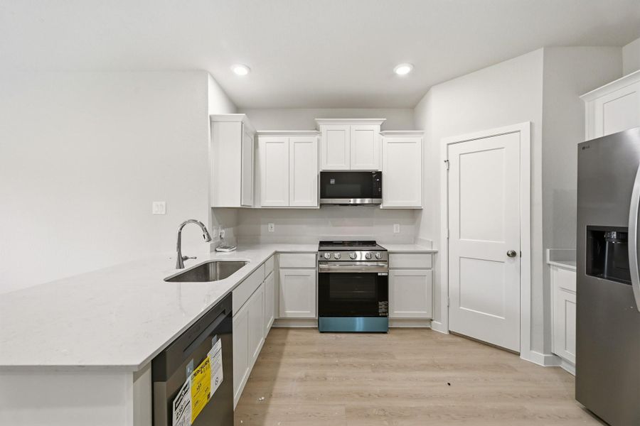Furnished interior view inside a new home in Crockett Meadows, Conroe (Image 7).