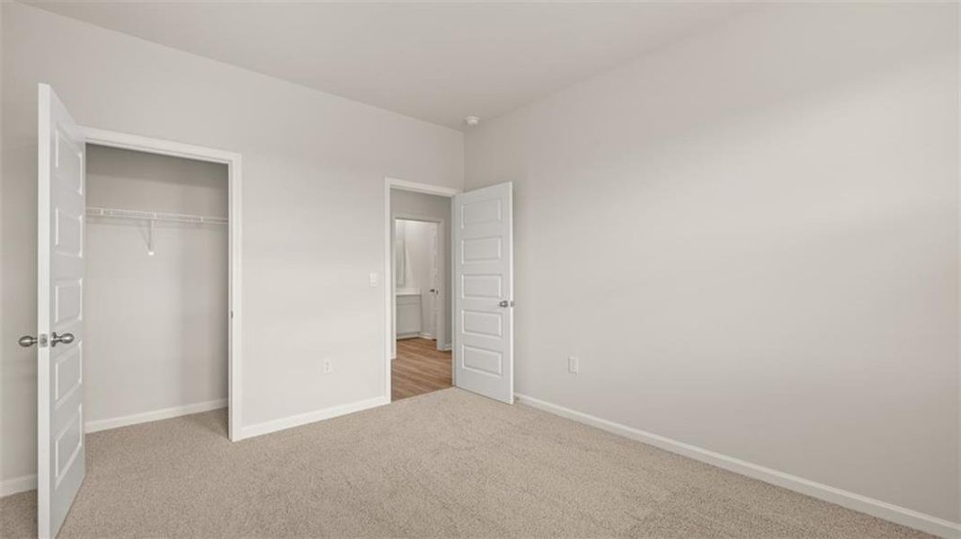 Spacious, unfurnished interior of a new home in Brooks Station, Dacula (Image 25).