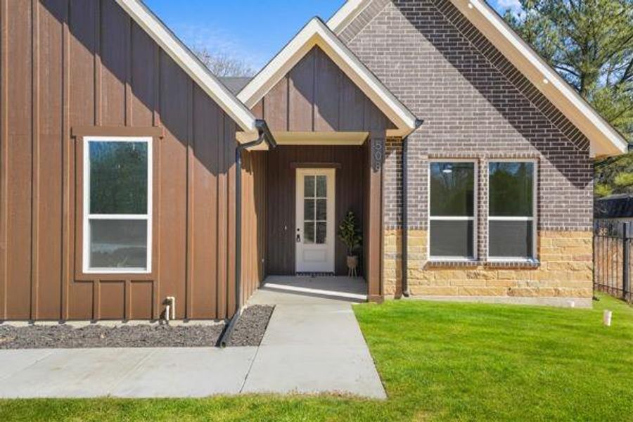 Exterior details and patio area of a home in , Tool (Image 3). Exterior details and patio area of a home in , Tool (Image 3).