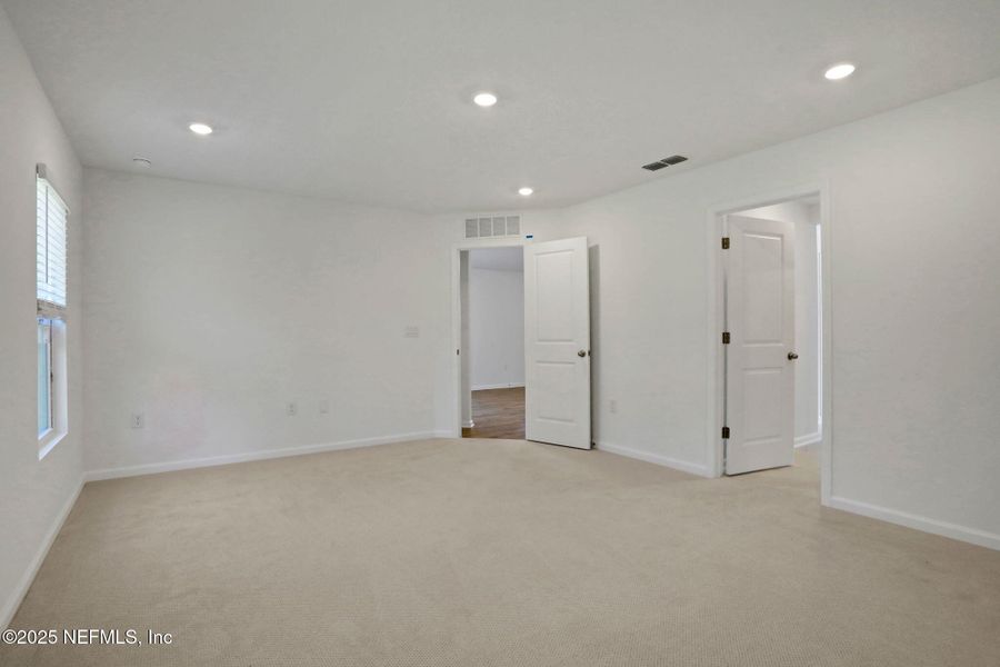Spacious, unfurnished interior of a new home in Cordova Palms, St. Augustine (Image 27).
