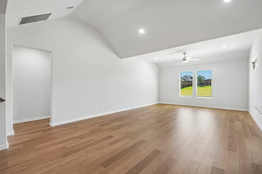 Living Room in the Wimbledon home plan by Trophy Signature Homes