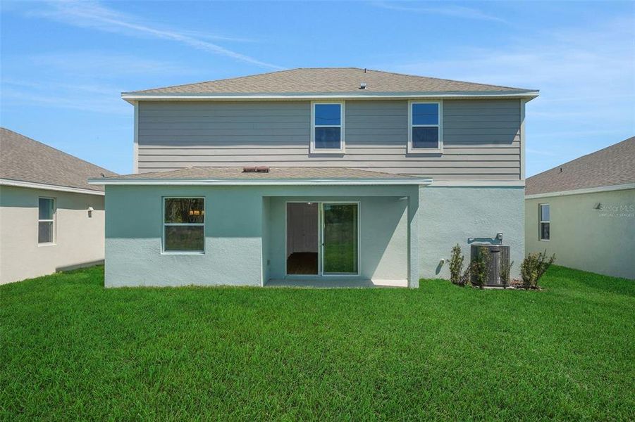 Exterior details and patio area of a home in Willowbrook North, Winter Haven (Image 4).