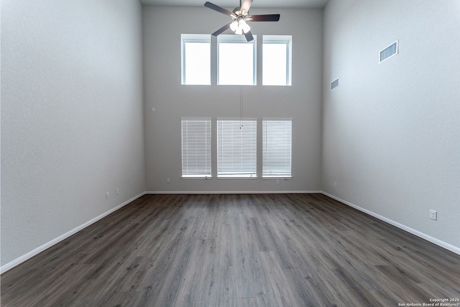 Spacious, unfurnished interior of a new home in The Woodlands at Medina Hills, Mico (Image 11).