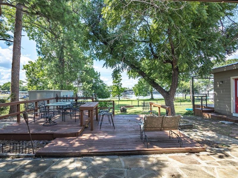Wooden terrace with outdoor dining space Wooden terrace with outdoor dining space
