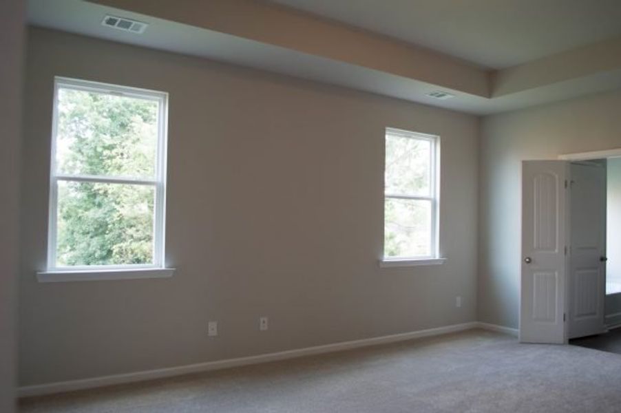 Representative unfurnished interior of a home built from the Poplar by Piedmont Residential in Falls Creek, Flowery Branch (Image 16).