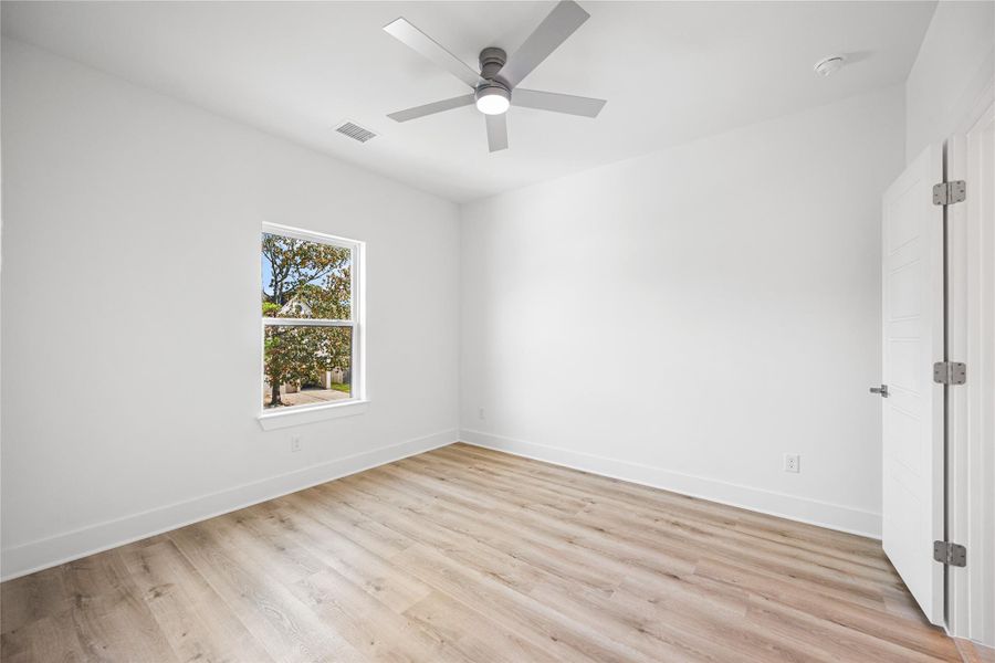 4th bedroom with ceiling fan