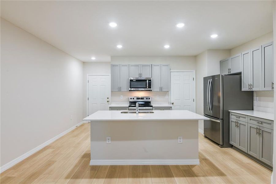 Furnished interior view inside a new home in Grove at Crosswind, Haines City (Image 7).