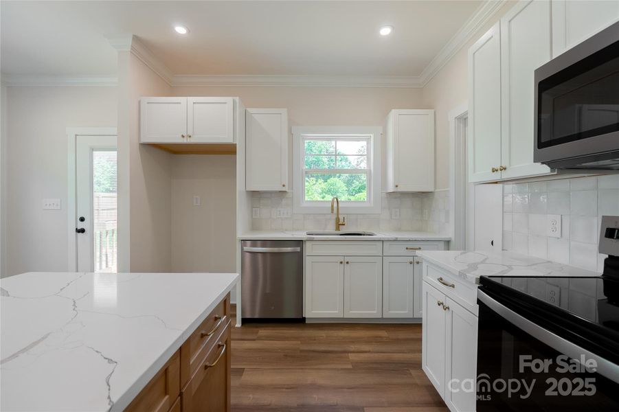 Furnished interior view inside a new home in , Huntersville (Image 10).