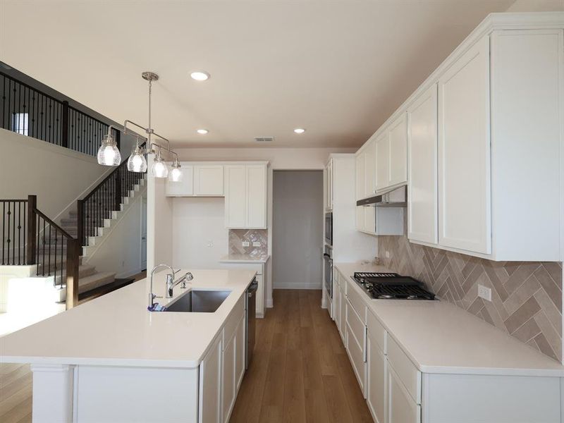 Furnished interior view inside a new home in Lily Creek at Sutton Fields, Aubrey (Image 4). Furnished interior view inside a new home in Lily Creek at Sutton Fields, Aubrey (Image 4).