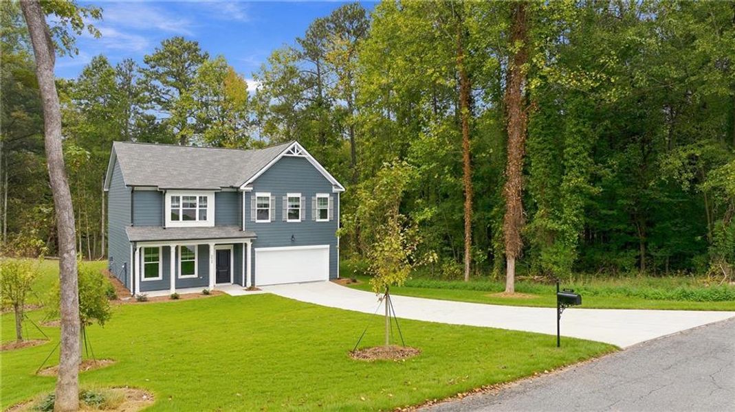 Front exterior of a new home in , Lawrenceville, GA, highlighting curb appeal (Image 22).