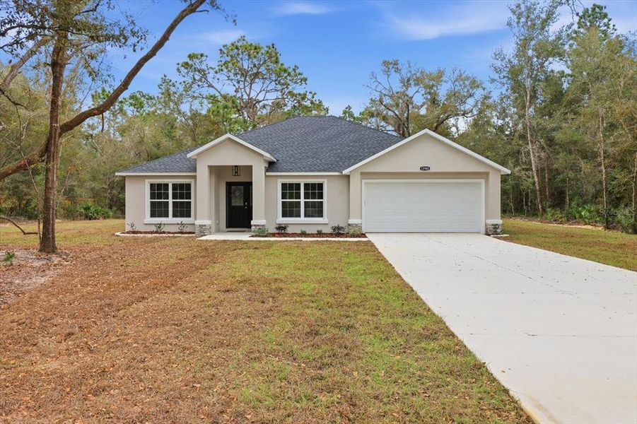 Front exterior of a new home in , Crystal River, FL, highlighting curb appeal (Image 28).