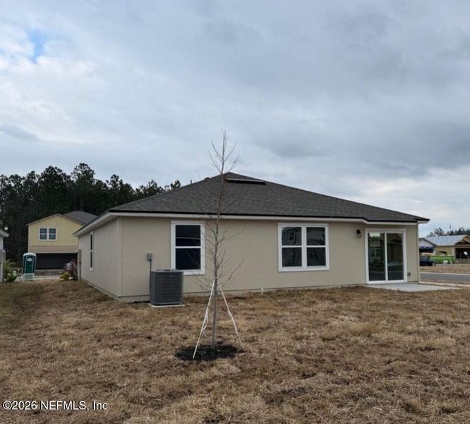 Exterior details and patio area of a home in The Arbors, Jacksonville (Image 8).